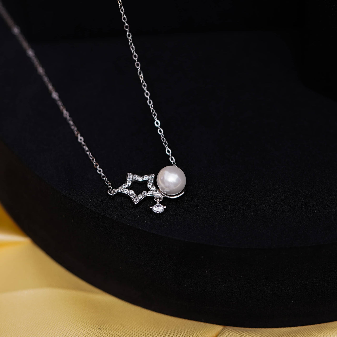Timeless Elegance: Zircon Star with Pearl Necklace